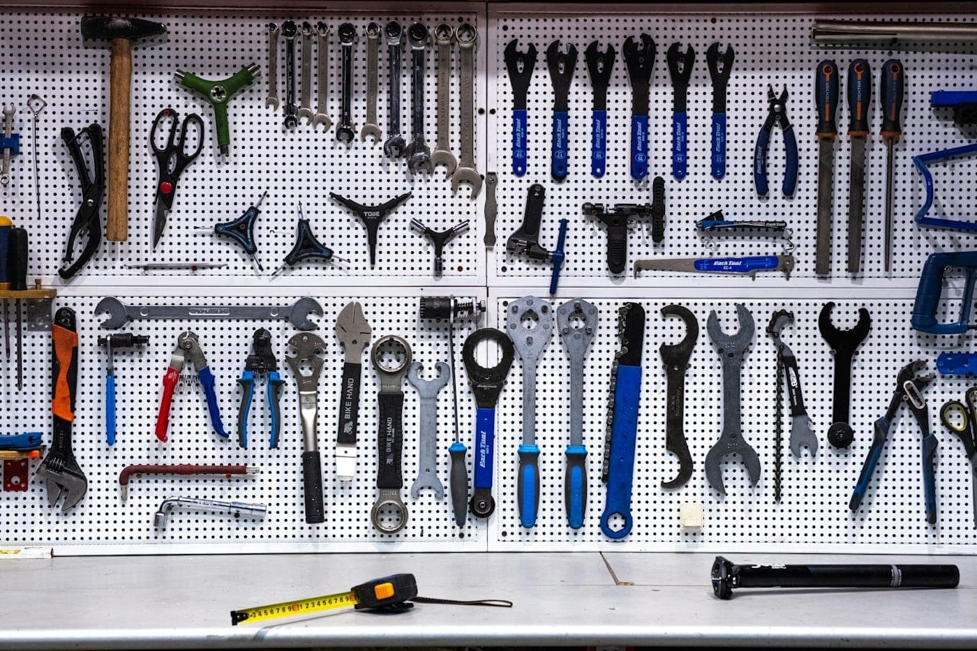 Stock concept image of hand tools arranged on a workshop wall